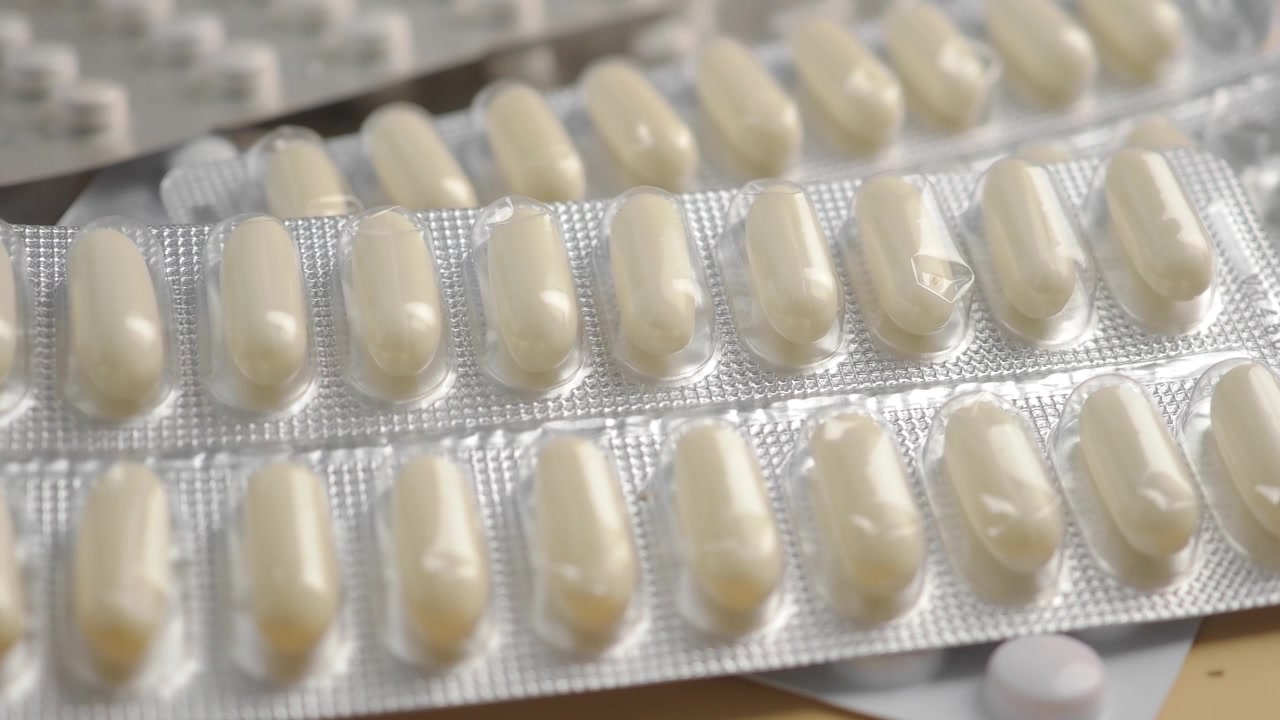 Close-up of Various Pills and Capsules in Blister Packs