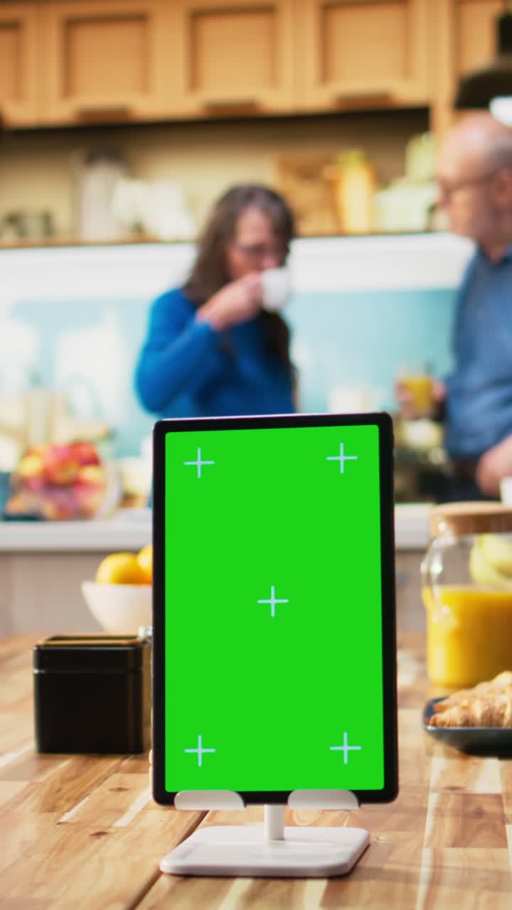 Vertical Video Vertical chroma key screen with old woman enjoying morning routine at home