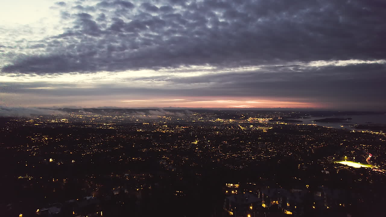 Aerial Reveal Oslo Cityscape At Dusk View From Holmenkollbakken Mountain In Norway