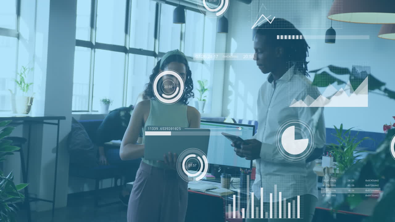 Animation of statistical data processing over diverse man and woman discussing over laptop at office