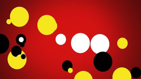 Animation-of-yellow,-black-and-white-spots-on-red-background