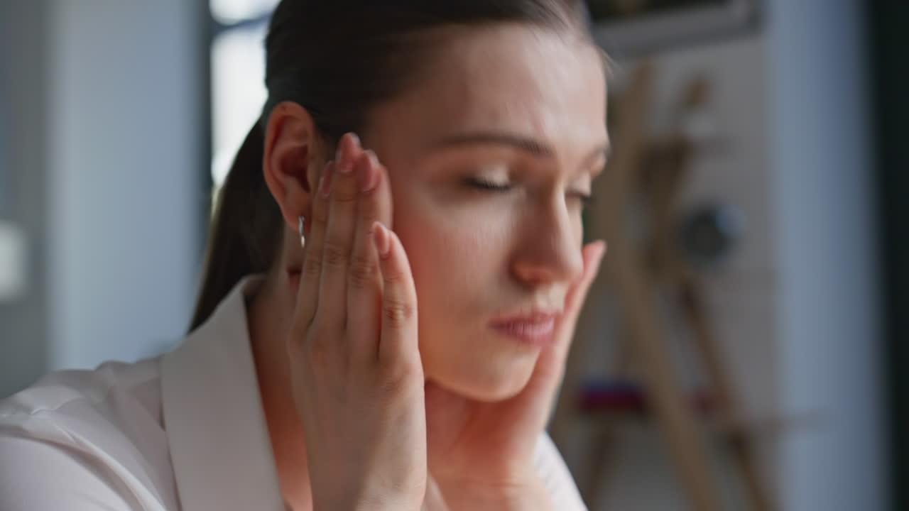 Closeup businesswoman feeling stress solving problem on corporate workplace