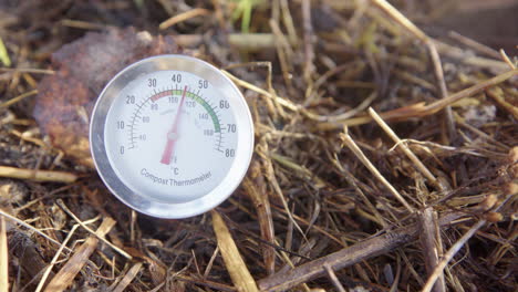 big closeup compost thermometer displaying an ideal composting temperature