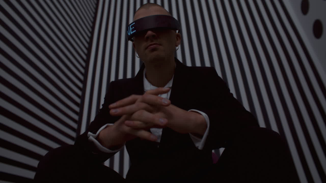 Man in VR Headset, Black Suit, Modern Setting