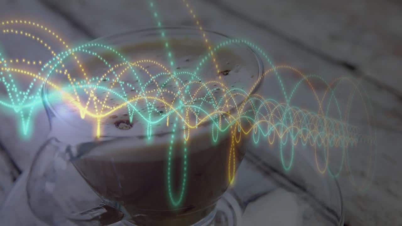 Glass coffee cup being showcased in animated illustration, with yellow and teal waveforms swirling