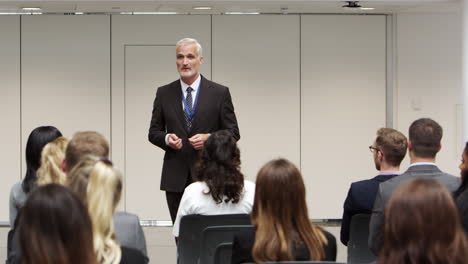 businessman making presentation at conference shot on r3d