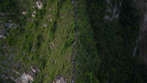 Circling-Kelingking-Cliff-Track-Down-To-Beach-On-Nusa-Penida-Island-Indonesia