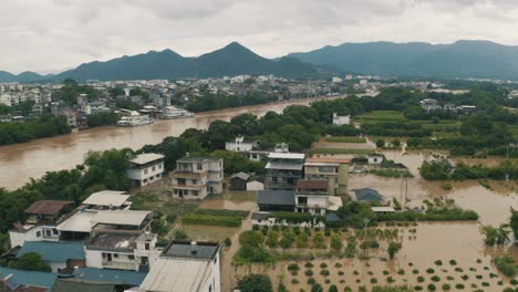 water damage to buildings in guilin, china, heavy rain consequences, drone view