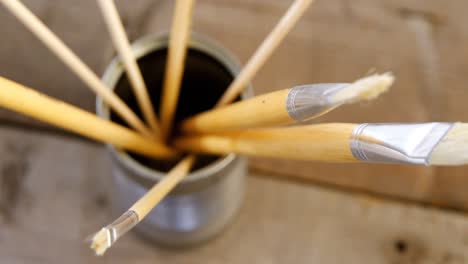 various paintbrush in container