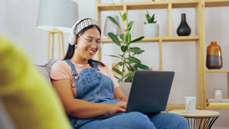 Music,-headphones-and-woman-with-a-laptop-typing