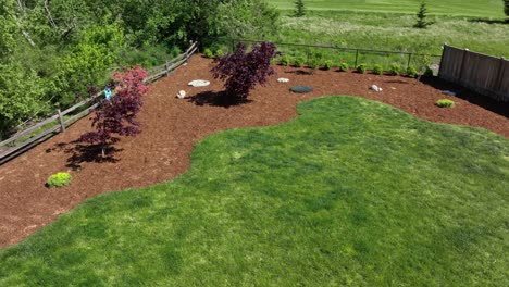 Aerial-view-of-a-well-maintained-backyard-space-with-a-fresh-layer-of-bark