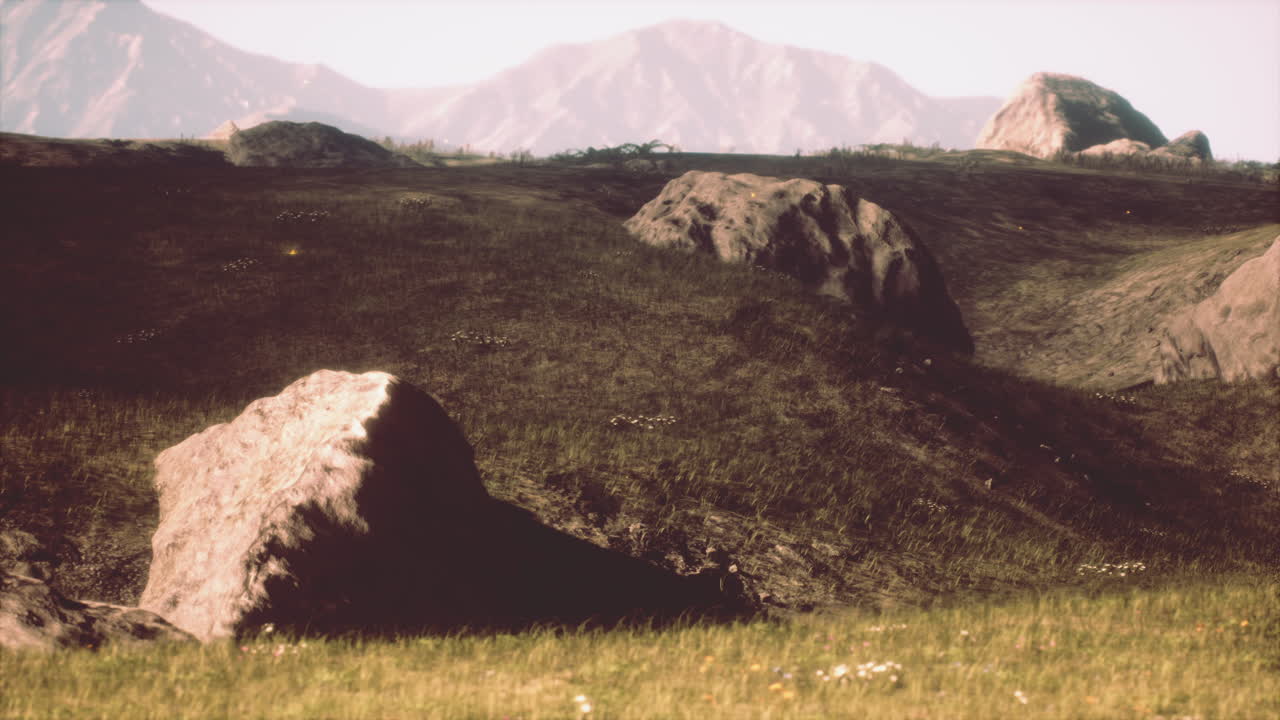 горный ландшафт с травяным полем и скалами