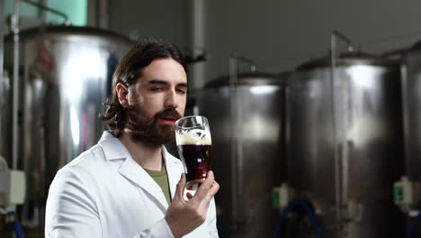 man tasting beer at brewery