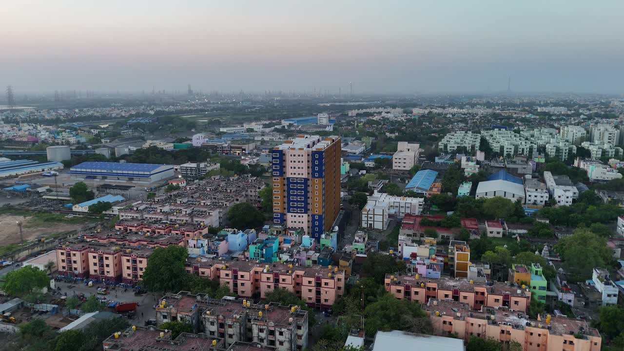 Birds-eye perspective of colorful rooftops packed closely together in Chennai, India