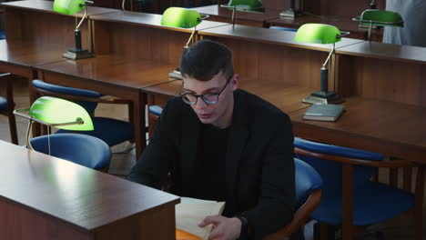 student reading in a library