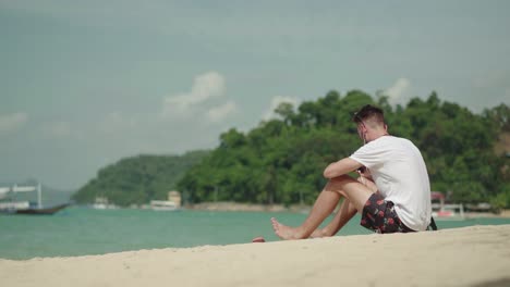 El-Nido-Island,-Philippines---Tourist-Enjoy-The-Tropical-Island-Composed-of-White-Sand,-Green-Trees-and-Calm-Sea---Perfect-for-Summer-Vacation---Wide-Shot