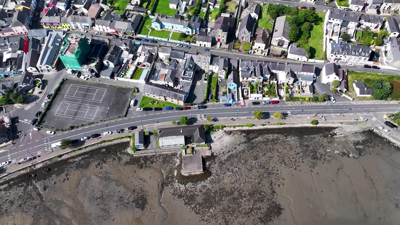 Birds eye top down view of Carlingford Castle and waterfront, sunny morning, Ireland