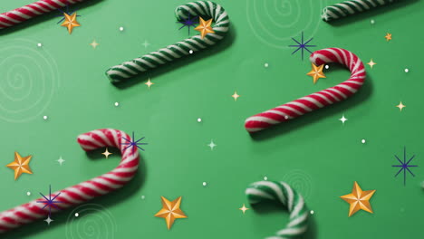 animation of stars over christmas candy canes