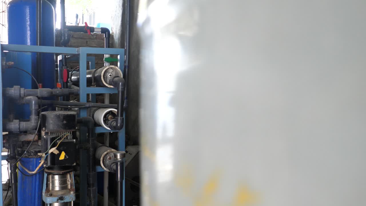 Industrial reverse osmosis water purification system working inside a water filtration plant in Sindh, Pakistan