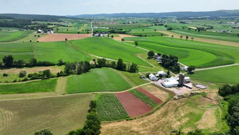 an aerial view of the lush green rural countryside of southern lancaster county, pennsylvania