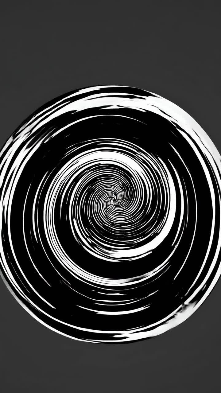 Abstract spiral pattern in black and white, viewed from a top-down angle, creating a hypnotic