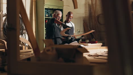 craftsmen working with wood in a workshop