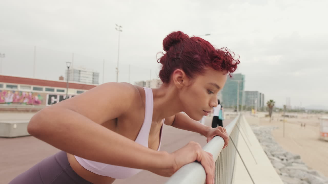 Fit Woman Doing Incline Pushups Outdoors
