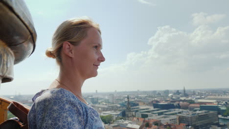 The-Woman-Admires-The-View-From-A-Height-To-Copenhagen-It-Stands-On-Top-Of-The-Church-Of-The-Savior-