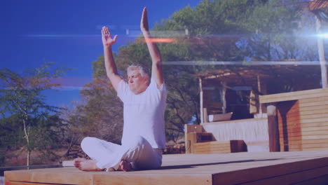 animación de puntos de luz sobre un hombre caucásico anciano practicando yoga y meditando