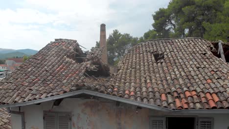 war-torn houses damaged - destroyed. aerial drone view