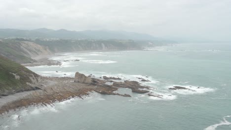 view of the cliffs of cabo vidio with the sea calm