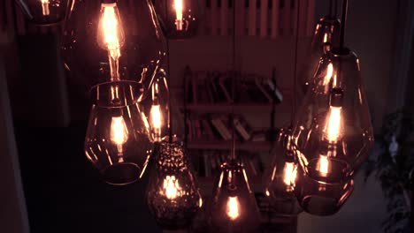 different shots of cool lights in hotel lobby giving a moody, modern and luxurious vibe