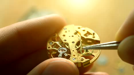 mechanical watch repair process, close up