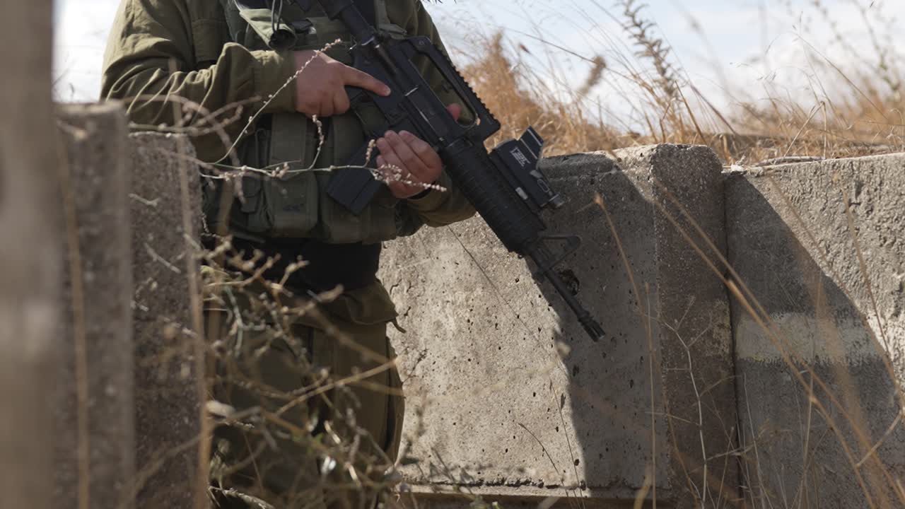 IDF military (Israel Defense Forces) tactical operation with assault rifles, Golan Heights, Gaza
