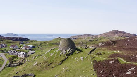 Advancing-drone-shot-of-the-'Dun-Carloway-Broch'-on-the-west-coast-of-the-Isle-of-Lewis,-part-of-the-Outer-Hebrides-of-Scotland