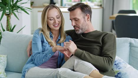 Loving-couple-talking-about-engagement-ring