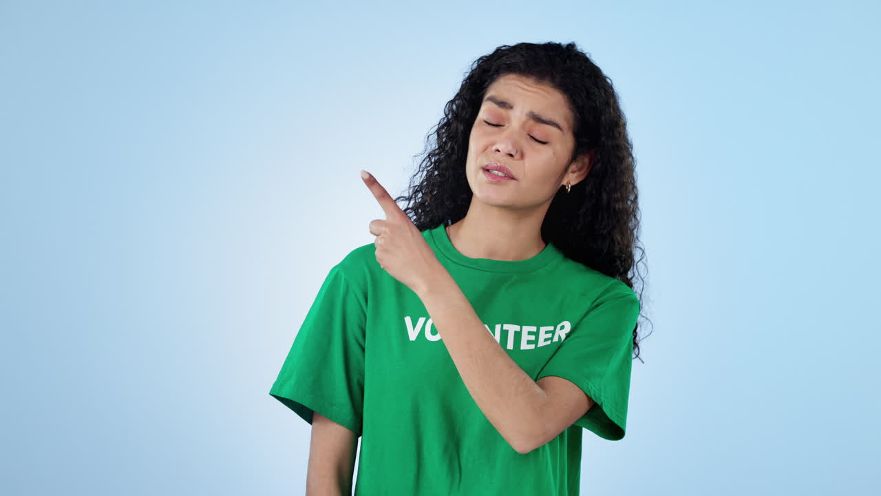 Volunteer, pointing to list