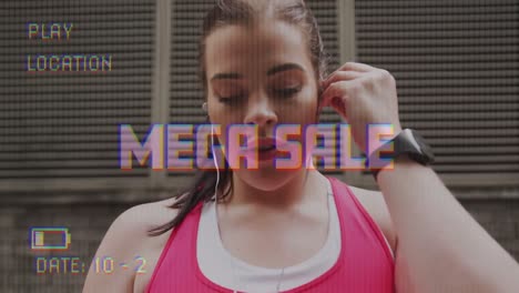 animation of mega sale text on video camera screen with digital interface and woman exercising