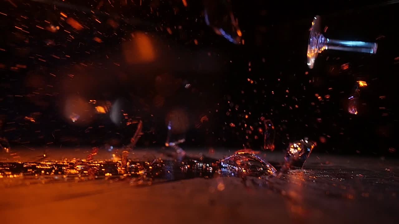 Wine glass breaking on ground