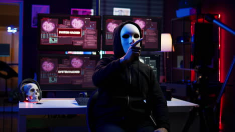 hacker doing online activism, wearing anonymous masks and filming video