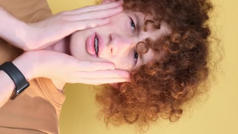 negative emotions on the camera of a young man a student with curly hair the emotion of disgust negative emotions on the camera of a young man a student with curly hair the emotion of disgust revulsion