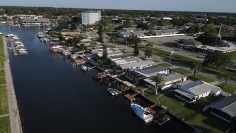 Aerial-view-of-perfect-landscaped-waterfront-homes-on-canal