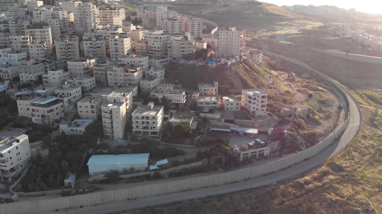 Israel Palestine divided by security fence in Jerusalem aerial view