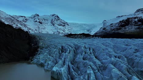 fly over svinafellsjokull glacier in iceland - aerial shot