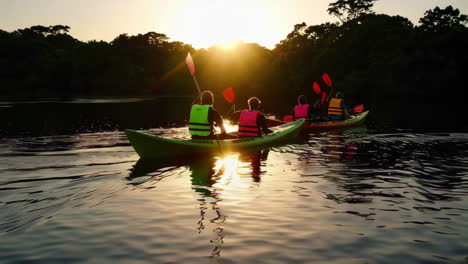 kayaking at sunset on a serene lake