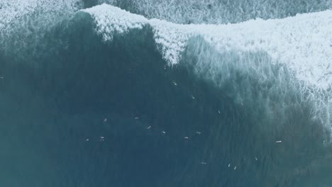 Aerial-Top-Down-Drone-view-of-surfers-at-La-Bocana-El-Tunco-El-Salvador