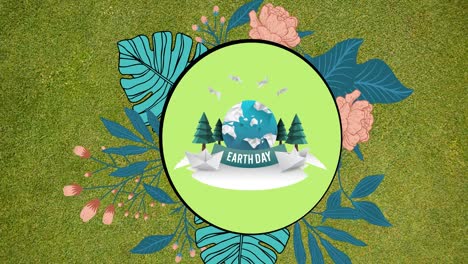 animation of earth day text and ecology logo over flowers on green background