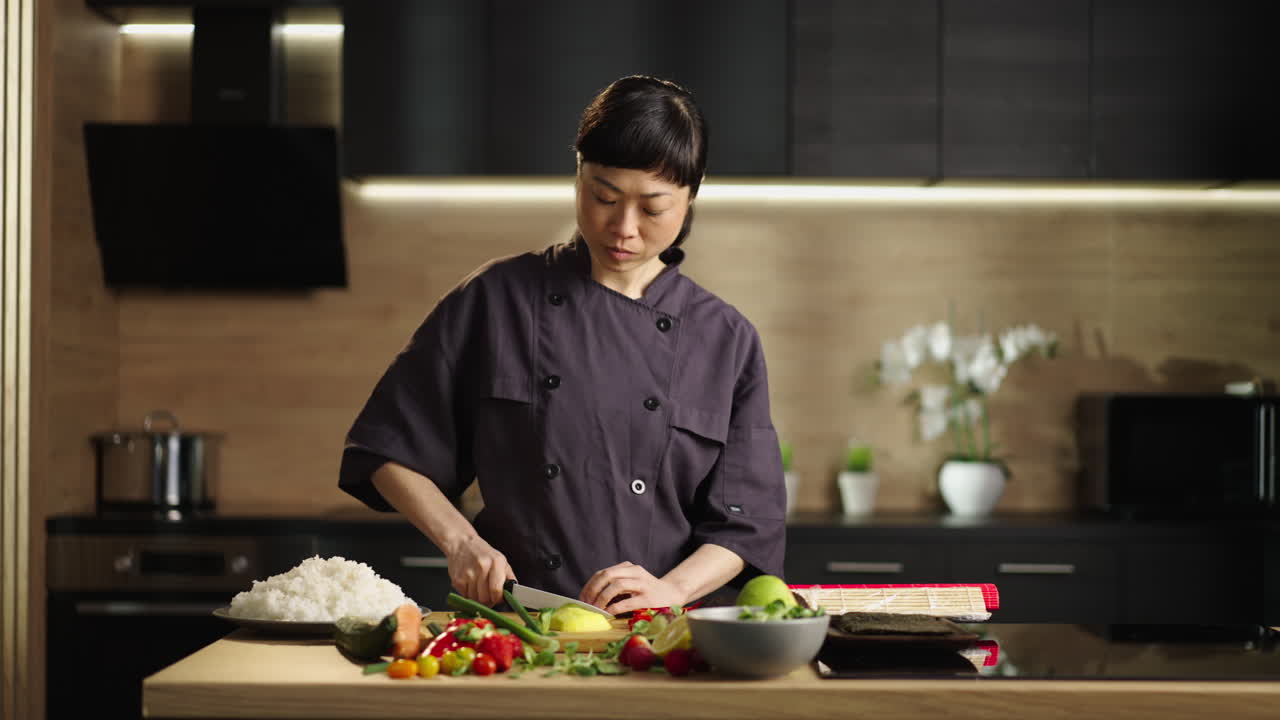 Sushi chef preparing ingredients in the kitchen