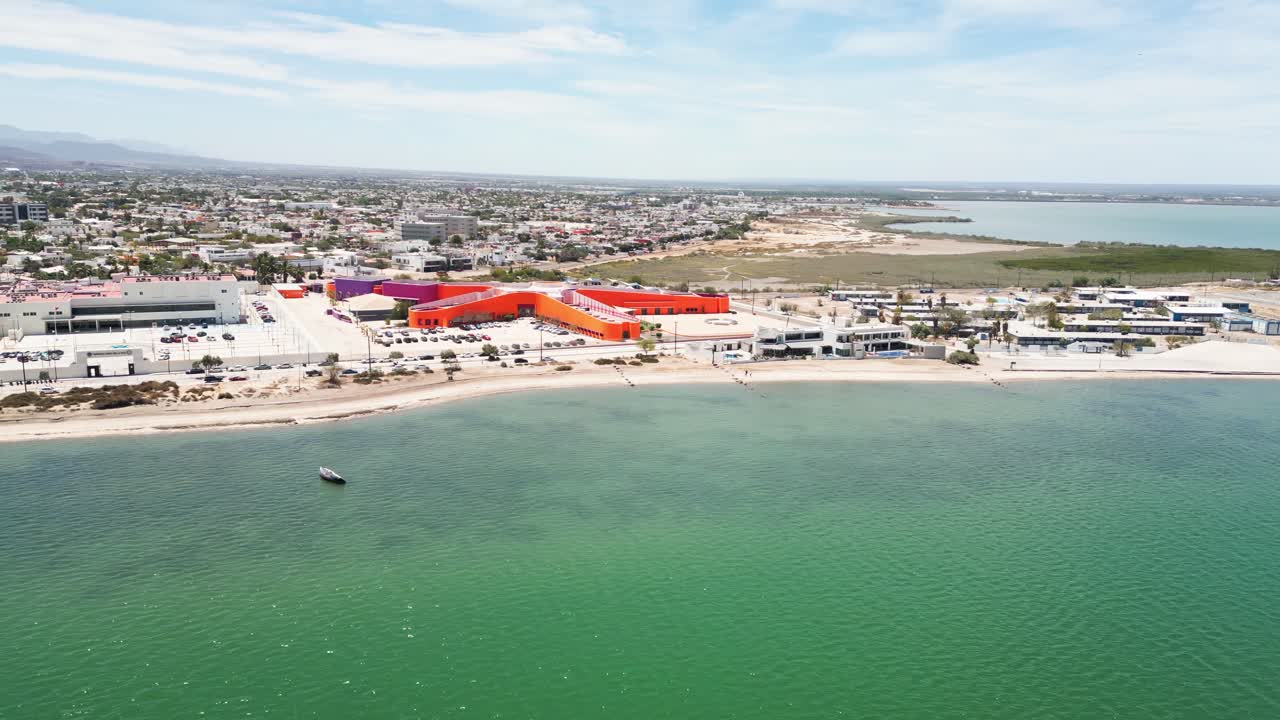 Playa posada beach and colorful buildings in la paz, baja california sur, aerial view