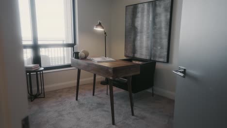 push in shot of a minimal desk setup in a home office